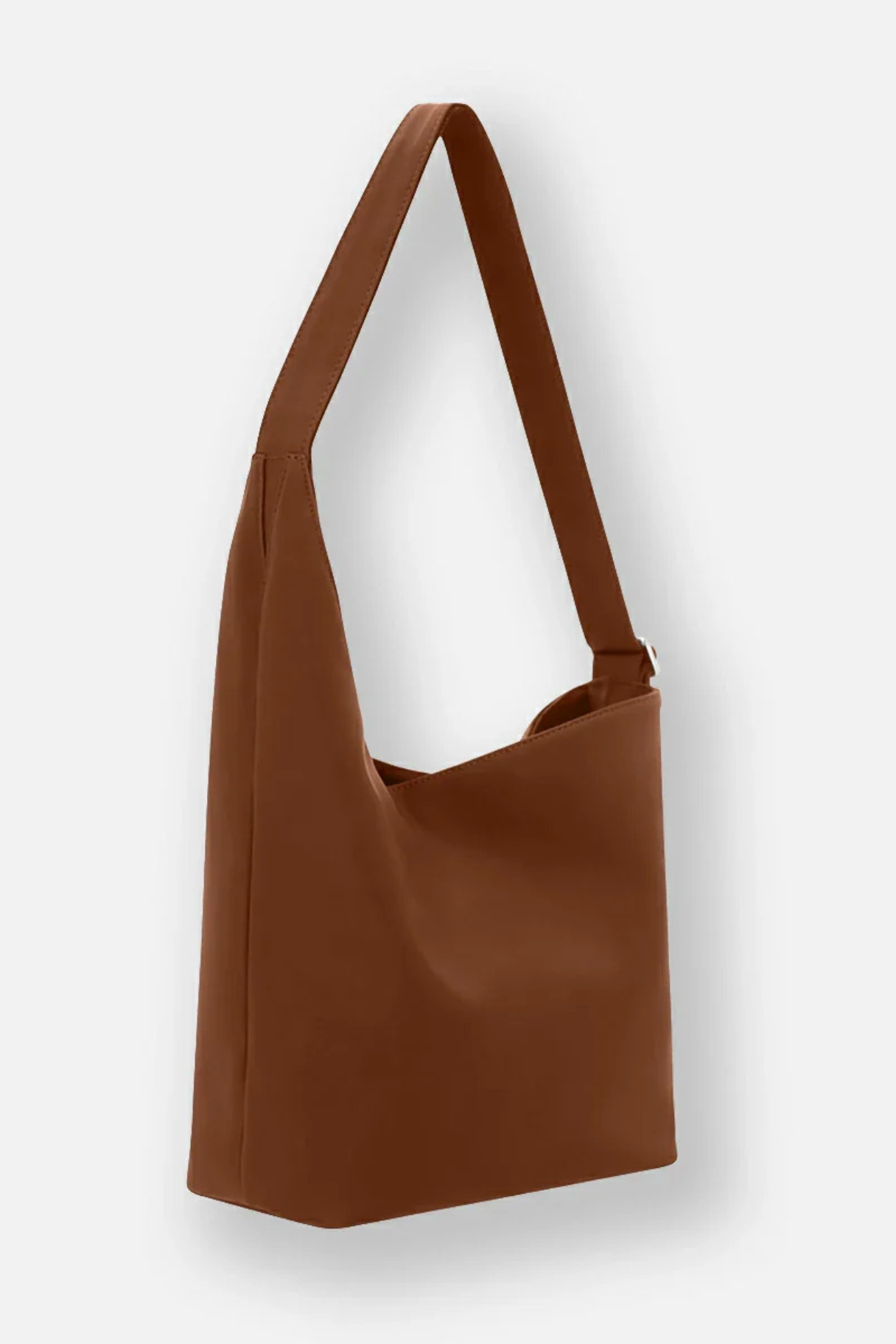 Sac Adastrée cognac vue profil silhouette asymétrique cuir pleine fleur