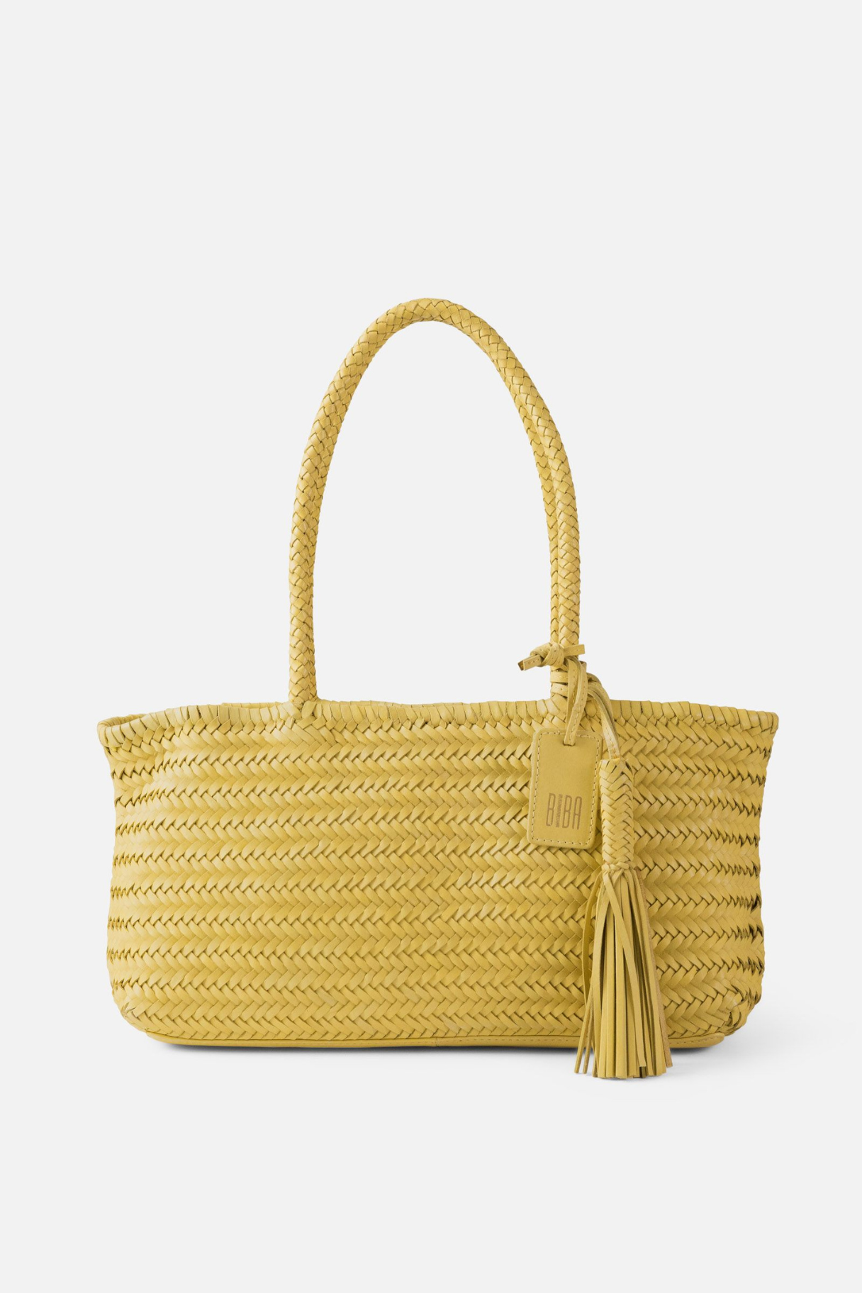 Sac cabas BIBA Perkins en cuir tressé jaune avec anses tressées et pompon décoratif