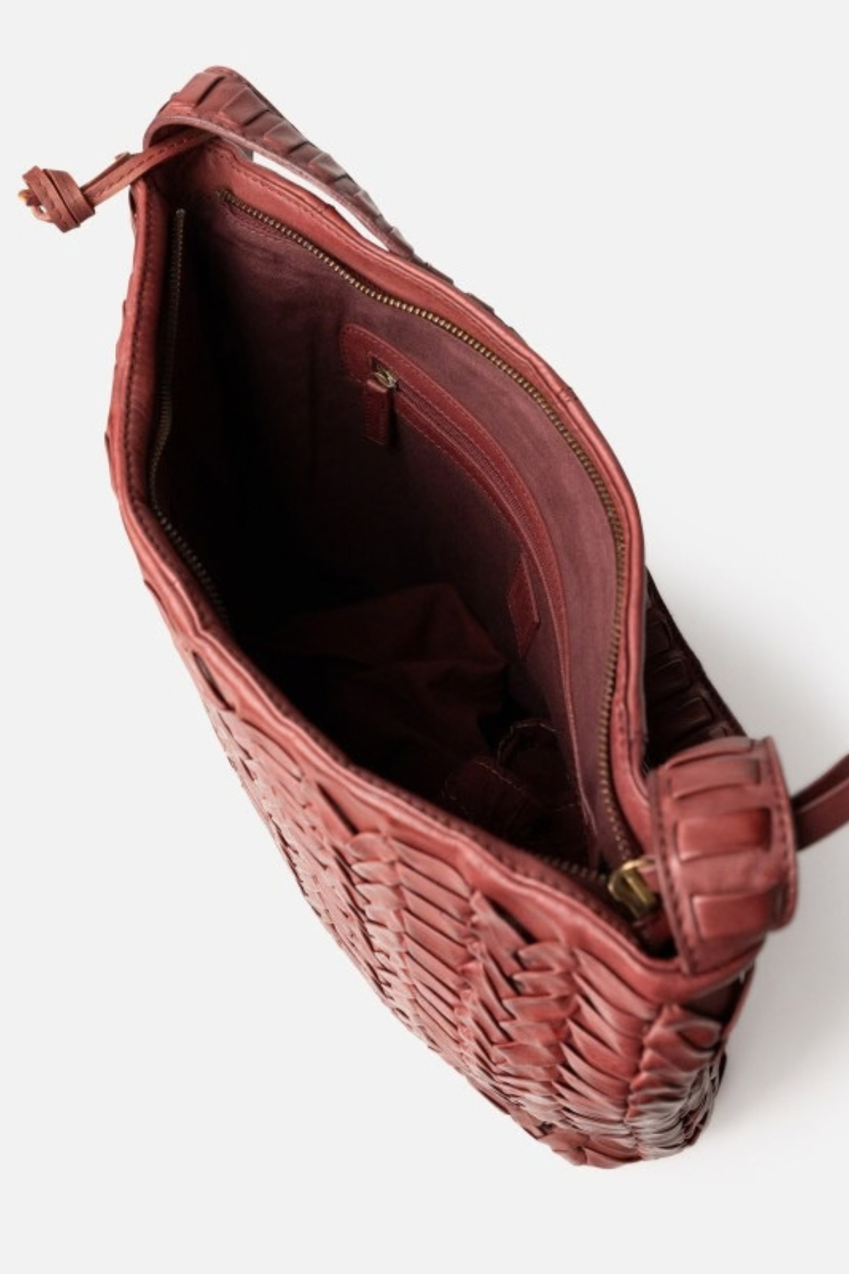Intérieur du sac hobo Biba brique : poche zippée et doublure coton
