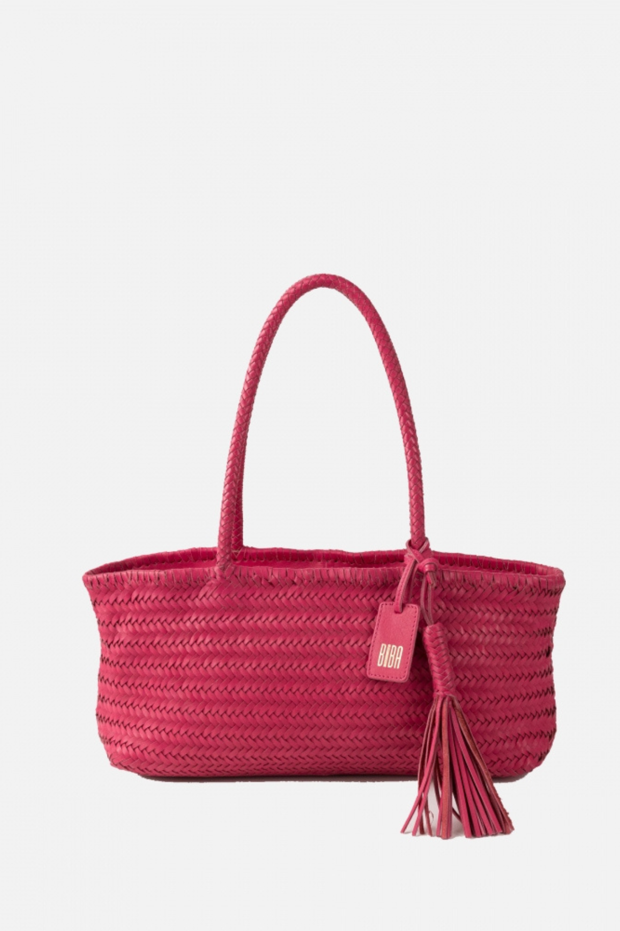 Cabas BIBA en cuir tressé rose fuchsia avec anses tressées et pompon décoratif